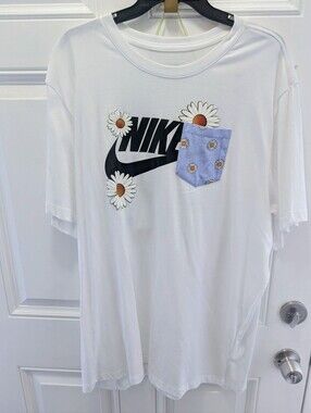 Nike White Tee with Black Logo and Blue Daisy Pocket